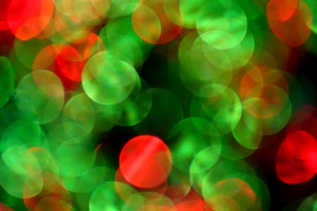 Blurred background of red and green.  Perfect abstract background for Christmas.の写真素材
