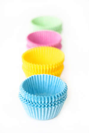 Colorful cupcake/muffin cups isolated on white.の写真素材