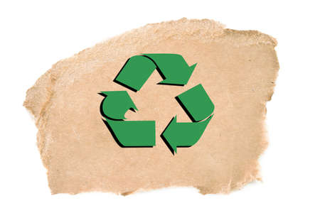 Torn corrugated cardboard on white background with a recycle symbol.の写真素材