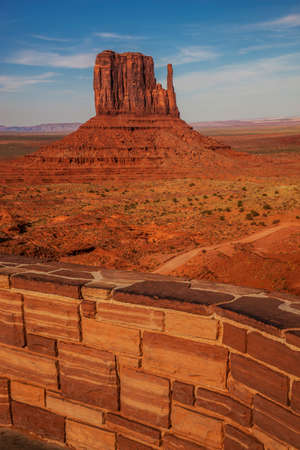 View of Monument Valley with brick wallの写真素材