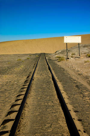 Sand dune that has engulfed a railway line in Namibiaの写真素材