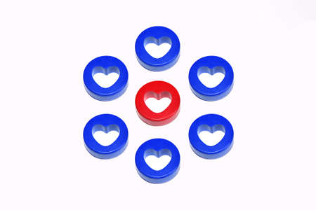 One blue heart surrounded by eight red heartsの写真素材