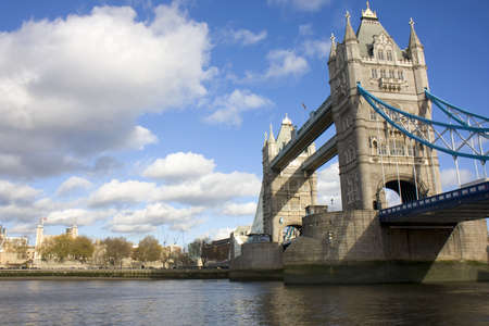 Shot of Tower Bridge from the south west side of the river Thames with the White Tower of the Tower of London in the distanceの写真素材