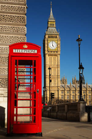 Phone box with the Palace of Westminster in the background の写真素材
