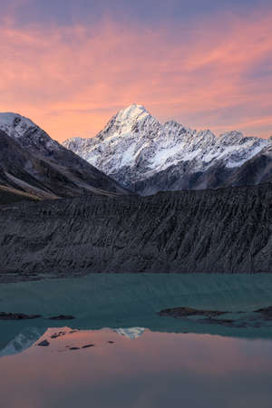 Dramatic view of Mount Cook from Kea point at sunset with reflection in lake