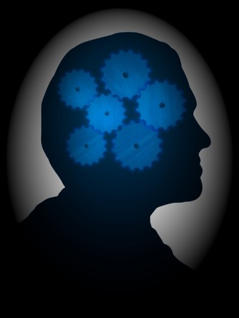 Illustrated profile of a man with cogs inside his headの写真素材