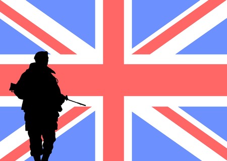 Silhouette of a British soldier with the flag of the United Kingdom in the backgroundの写真素材