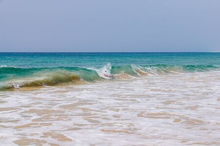 Body surfing at Santa Monica beach, Boa Vista, Cape Verdeの写真素材