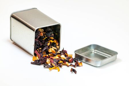 Hibiscus dried fruit tea from a metallic tin containerの写真素材