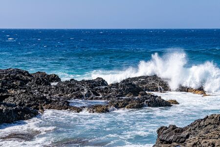 Rocky volcanic coastline at Mirador Playa Los Guirres, La Palma, Canary Islands, Spainの写真素材