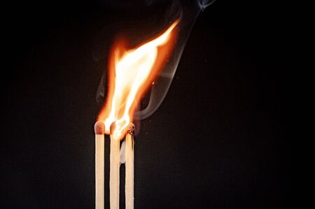 Burning flame from matchstick ignitionの写真素材