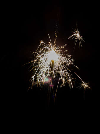 Sparklers burning brightly on bonfire night