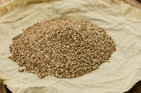 The ripe buckwheat seeds on the wrapping-paperの写真素材