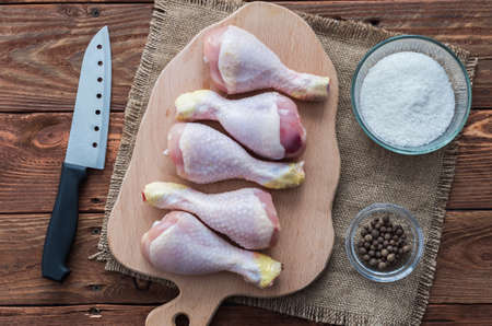 The chicken feets on the cutting boardの写真素材