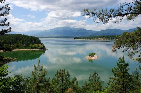 A view of the beautiful lake reservoir Koprinka, which is near Kazanlak in Bulgariaの写真素材
