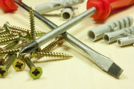 various work tools on wooden panelの写真素材