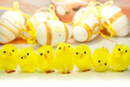 Happy Easter with toy yellow chicksの写真素材