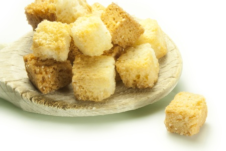cubes of toasted bread toasted in a panの写真素材