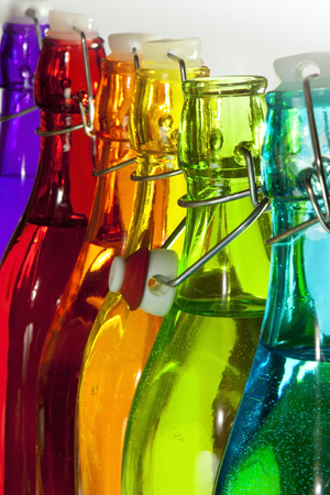 glass bottles of different colorsの写真素材