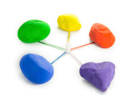 stones of different colors that come together with the colored wiresの写真素材