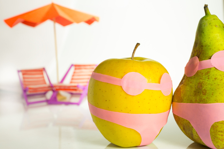 representation of women do not fit in a swimsuit like apple and pearの写真素材