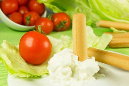 dietetic food breadsticks and cream cheeseの写真素材