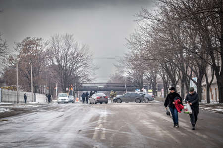 Dnipro, Ukraine Mar 11, 2022: neighborhood, rocket, house, fire, bomb, shooting, people,のeditorial素材
