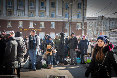Dnipro, Ukraine - Mar 12, 2022 railway station, aid, refugees, queue, people, families, children, waiting, humanitarian, tent, evacuationのeditorial素材