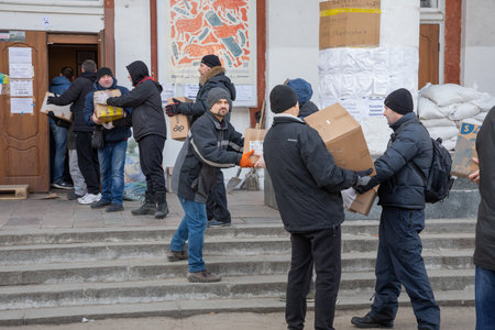 Dnipro, Ukraine - Mar 16, 2022 Volunteers, Humanitarian, Aid, People, Ukraine,のeditorial素材