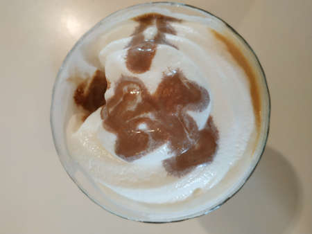 coffee with milk with bonbon candy
