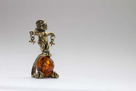 Weights on the ball figurine gold colorの写真素材