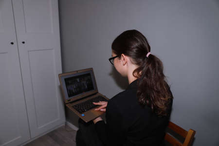 freelance routine - young girl is getting ready for work callの写真素材