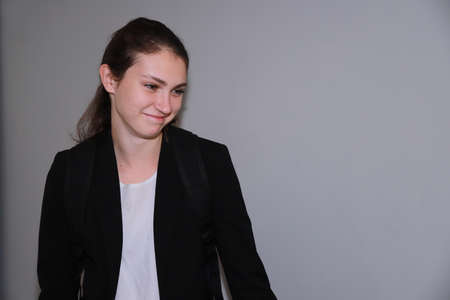 freelance routine - young girl is getting ready for work callの写真素材