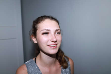 behind the scenes of going on a date - young girl is doing her makeup