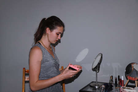 Getting ready for a date - behind the scenes of make upの写真素材