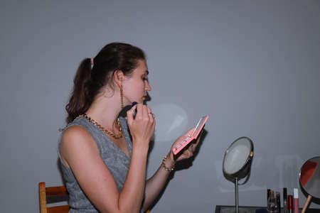 Getting ready for a date - behind the scenes of make upの写真素材