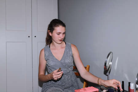 Getting ready for a date - behind the scenes of make upの写真素材