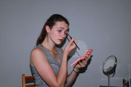 Getting ready for a date - behind the scenes of make upの写真素材