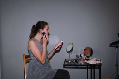 Getting ready for a date - behind the scenes of make upの写真素材