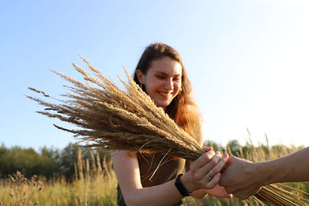 russian village scenery - hot summer day on the countryside with a young girlの写真素材