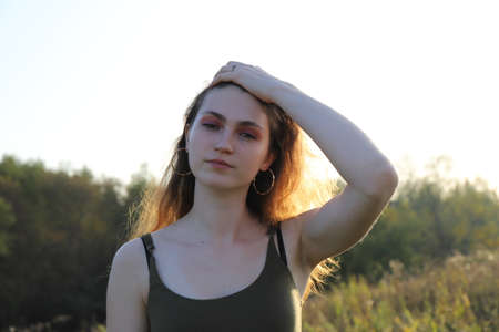 russian village scenery - hot summer day on the countryside with a young girlの写真素材