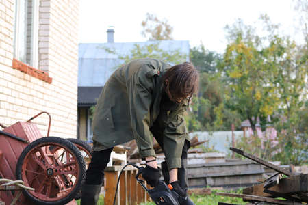 Portrait photo of a young urban man on the countrysideの写真素材