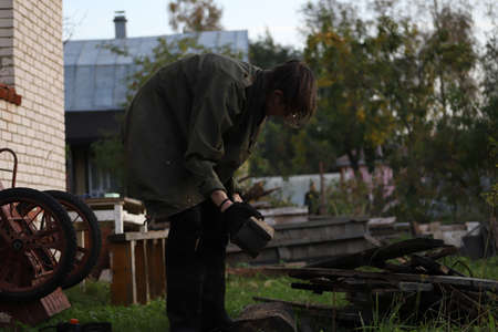 Portrait photo of a young urban man on the countrysideの写真素材