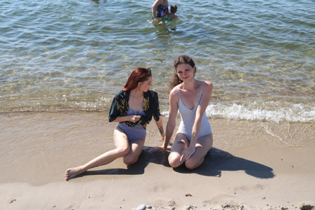group of friends having fun on the sea beachの写真素材