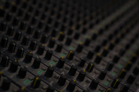 Music recording console, professional equipment, switches, amplifier. High quality photoの写真素材