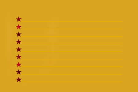 Sparkles in the form of stars and stars with lines, a sheet of yellow Notepad, top viewの写真素材