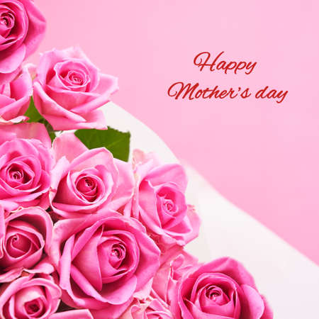 Greeting card with beautiful pink roses with text Happy mother's day. High quality photoの写真素材