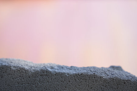grey stone sill on a pink background. High quality photoの写真素材