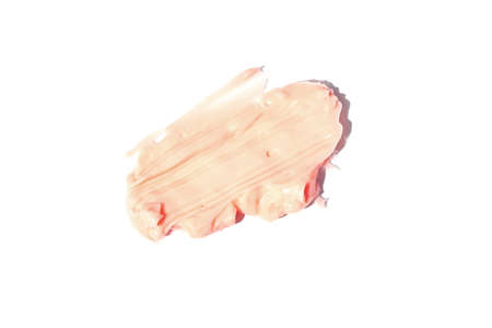 The smear and texture of the cream. Peach color isolated on a white background. An element for cosmetic beauty design. High quality photoの写真素材