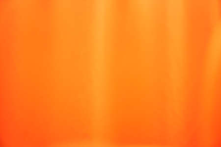 Bright orange background from textile material. Fabric with natural texture. High quality photoの写真素材